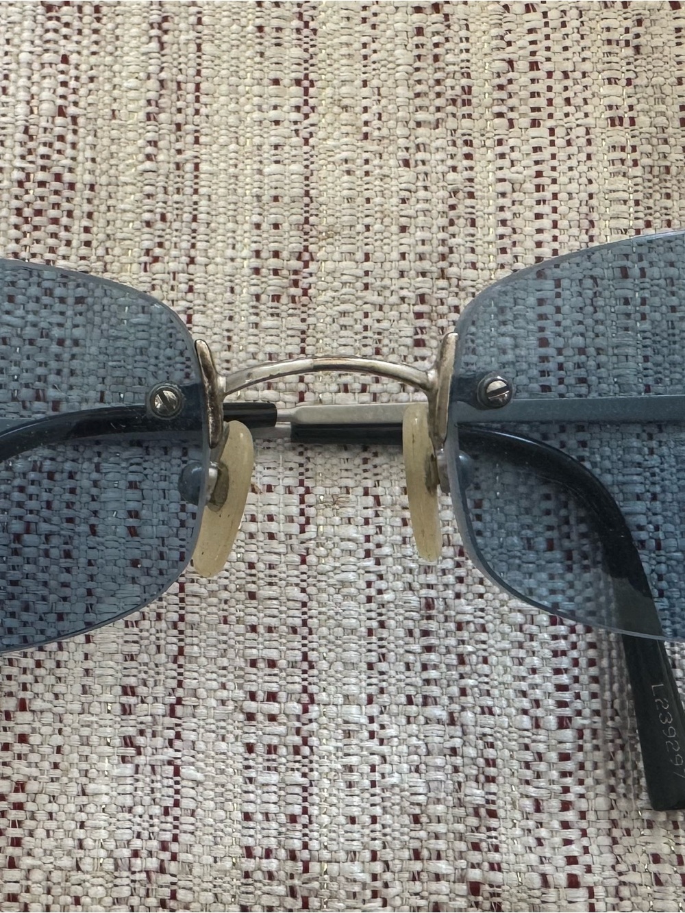 CHANEL Rimless Sunglasses with Blue Lenses and Gold Bridge